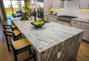 Kitchen Island Counter Top With Bar Stools And Decorator Items